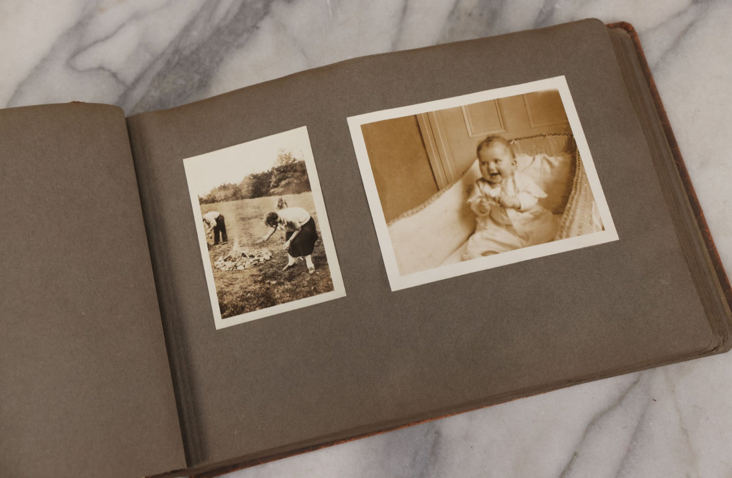 Lot 062 - Vintage Snapshot Photo Album With 125+ Photographs Including Photos Of Spirit Of St. Louis Plane, Redwood Forest, Automobiles, Outings, Comic Wedding Posters, Statue Of Liberty, Beachwear, And More