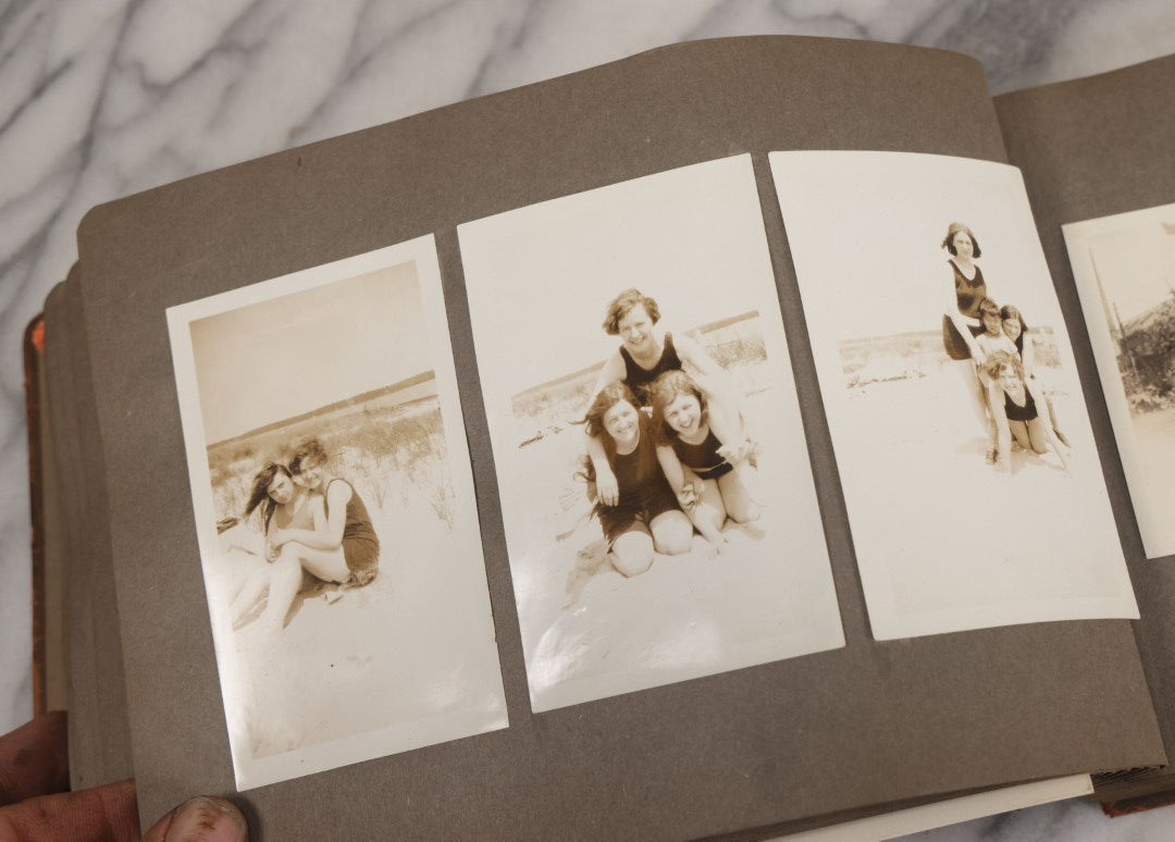 Lot 062 - Vintage Snapshot Photo Album With 125+ Photographs Including Photos Of Spirit Of St. Louis Plane, Redwood Forest, Automobiles, Outings, Comic Wedding Posters, Statue Of Liberty, Beachwear, And More