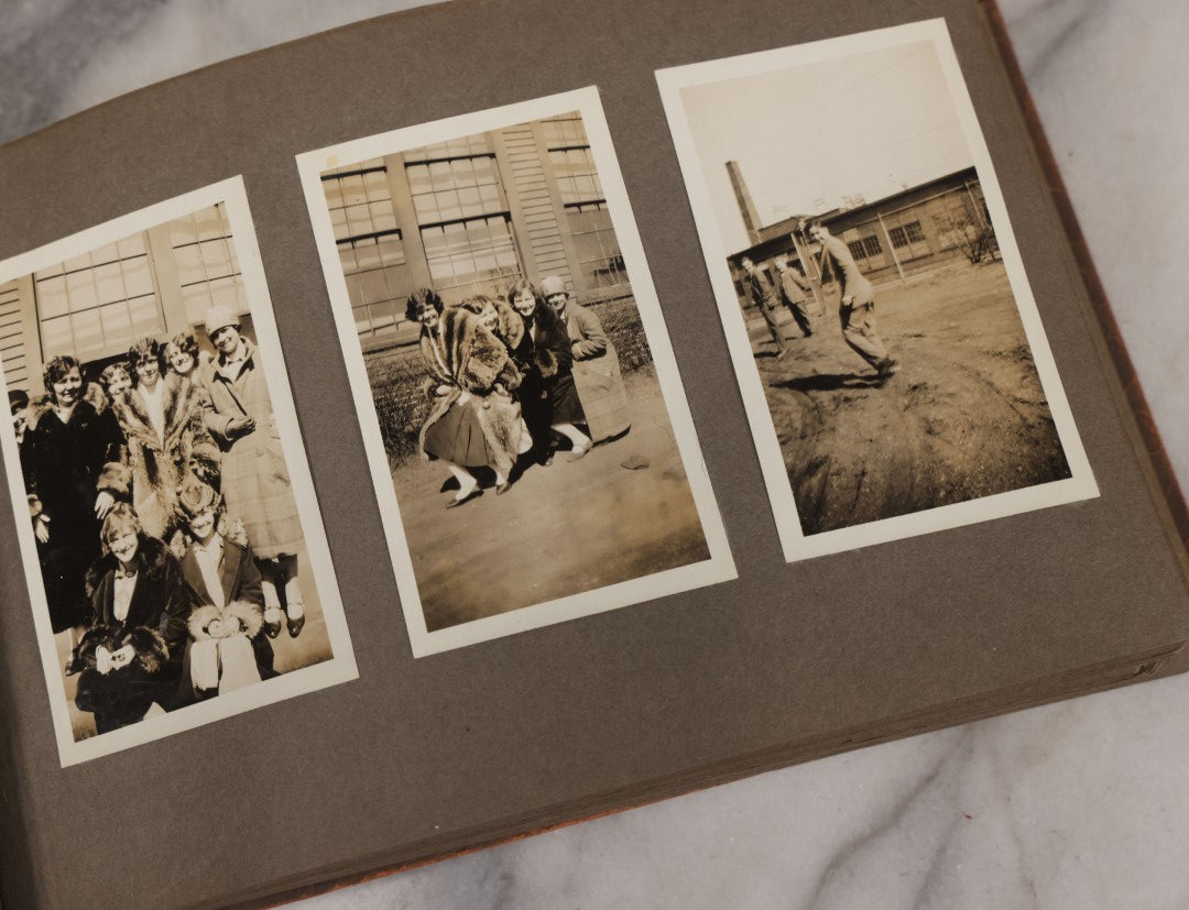 Lot 062 - Vintage Snapshot Photo Album With 125+ Photographs Including Photos Of Spirit Of St. Louis Plane, Redwood Forest, Automobiles, Outings, Comic Wedding Posters, Statue Of Liberty, Beachwear, And More