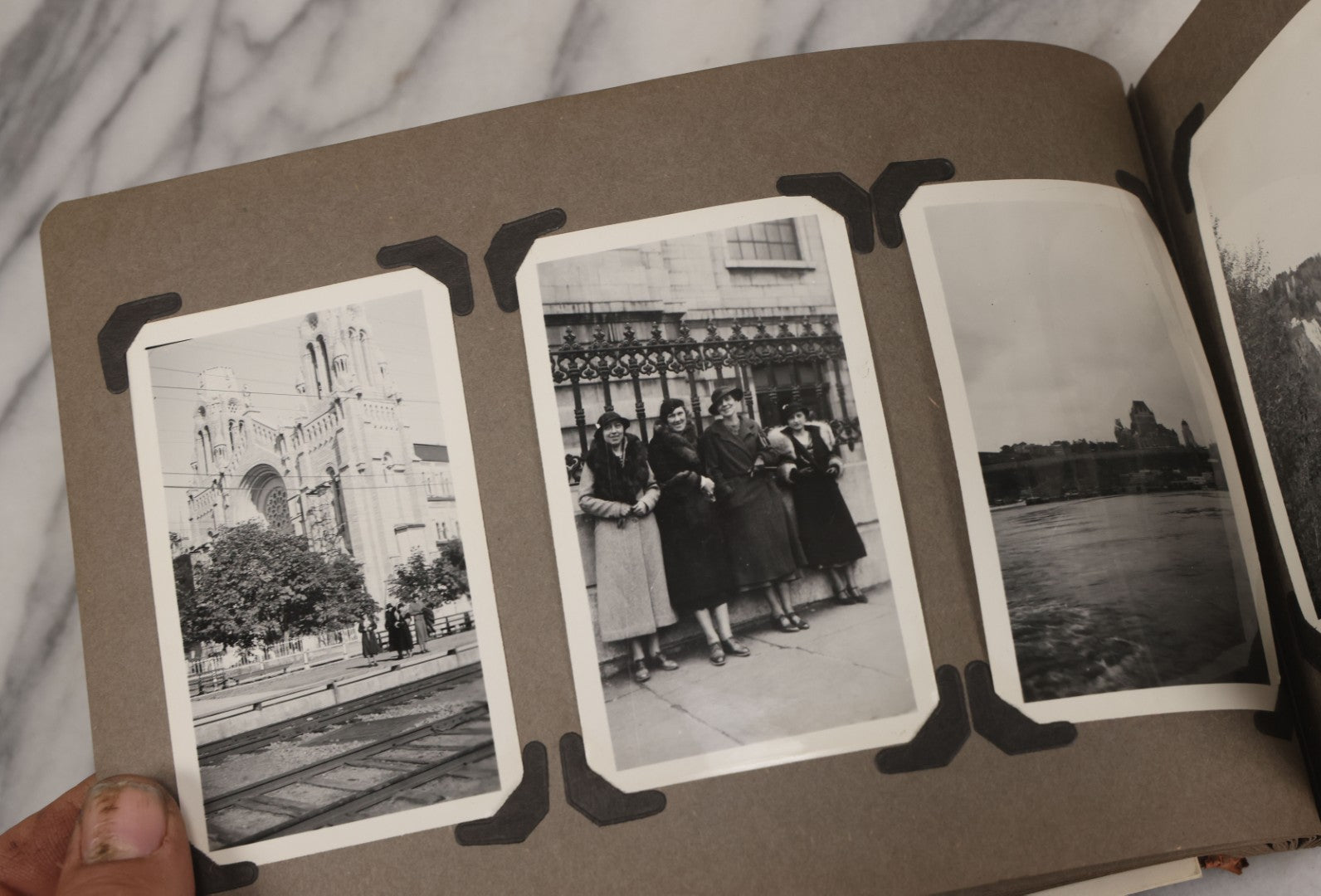 Lot 062 - Vintage Snapshot Photo Album With 125+ Photographs Including Photos Of Spirit Of St. Louis Plane, Redwood Forest, Automobiles, Outings, Comic Wedding Posters, Statue Of Liberty, Beachwear, And More