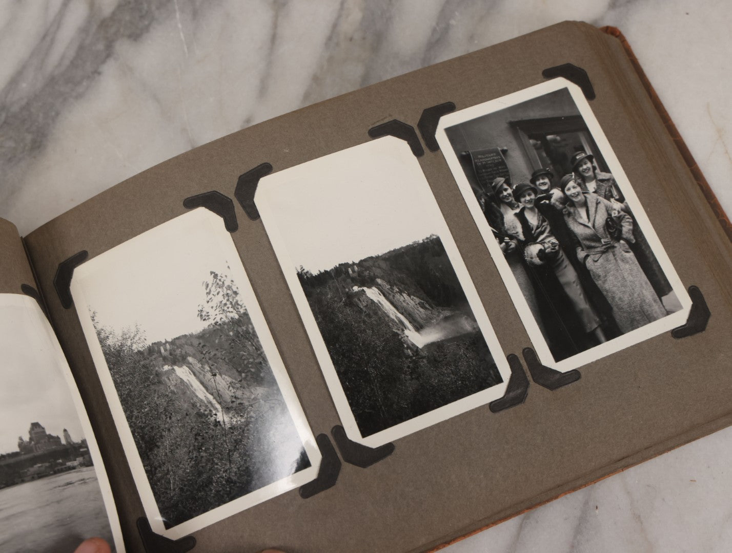 Lot 062 - Vintage Snapshot Photo Album With 125+ Photographs Including Photos Of Spirit Of St. Louis Plane, Redwood Forest, Automobiles, Outings, Comic Wedding Posters, Statue Of Liberty, Beachwear, And More