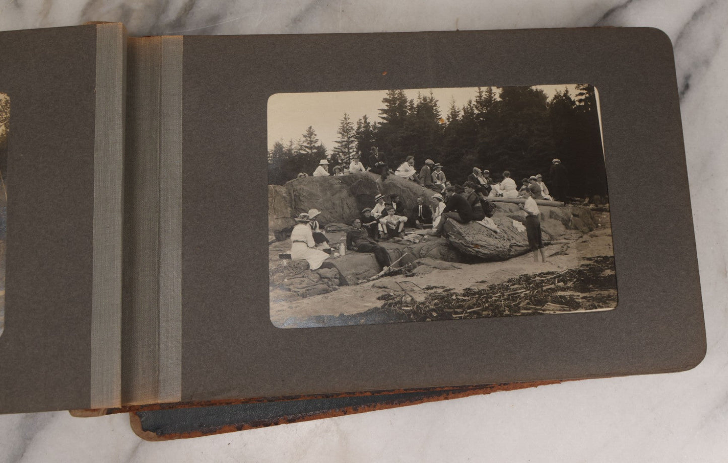 Lot 063 - Antique Snapshot Photo Album With 24 Photographs Of Turn Of The Century Coastal Towns And Farms With Group Photos Of Beach And Other Outings, Likely Maine, New England, Note Cover Detached