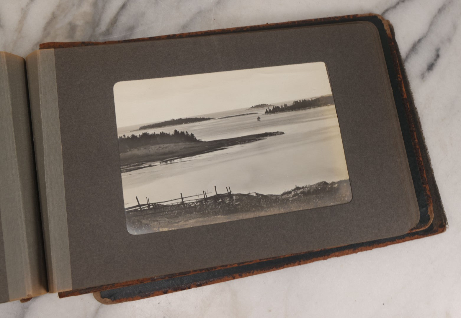 Lot 063 - Antique Snapshot Photo Album With 24 Photographs Of Turn Of The Century Coastal Towns And Farms With Group Photos Of Beach And Other Outings, Likely Maine, New England, Note Cover Detached
