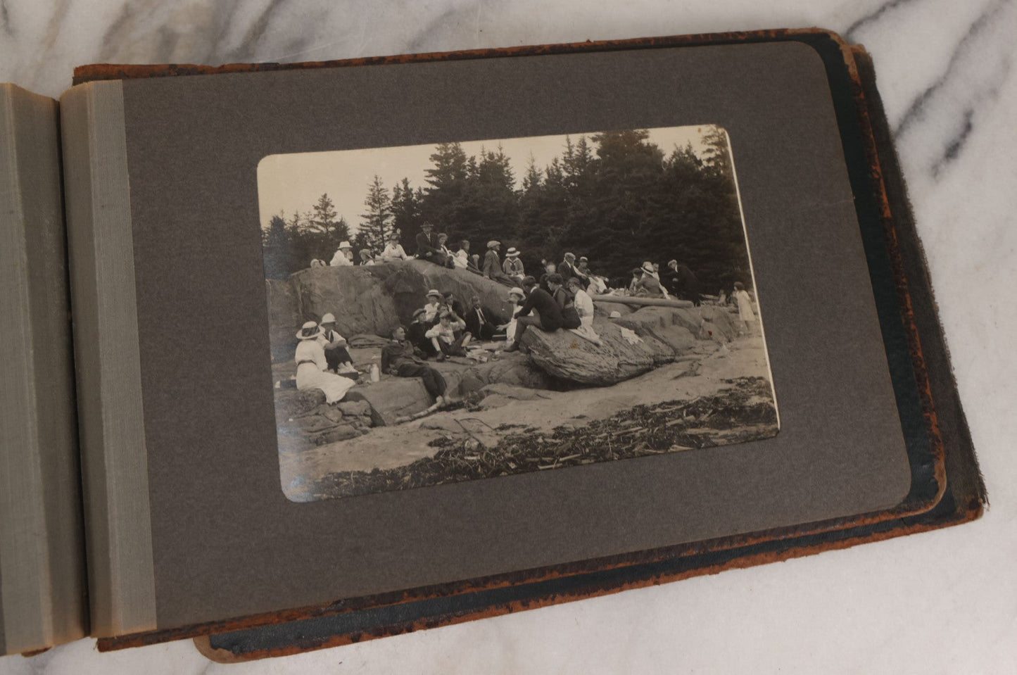 Lot 063 - Antique Snapshot Photo Album With 24 Photographs Of Turn Of The Century Coastal Towns And Farms With Group Photos Of Beach And Other Outings, Likely Maine, New England, Note Cover Detached