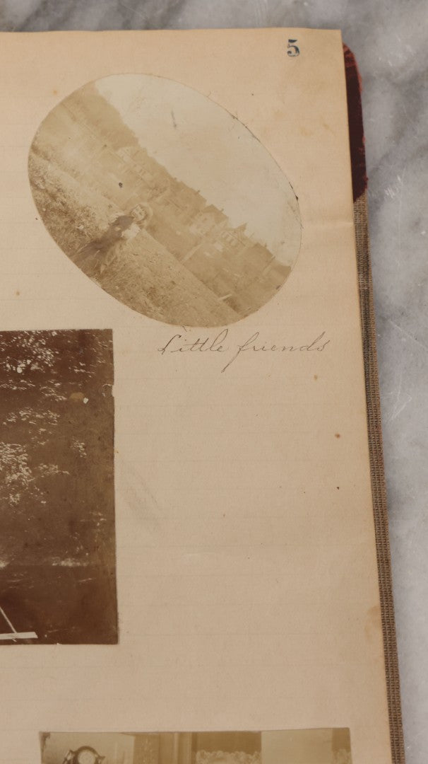 Lot 064 - Antique Snapshot Photo Album Scrapbook Contained In A Record Ledger With 40+ Photos And Scraps, With Handwritten Enscriptions, Including Interior Photos, Outdoor Photos, And More, Circa 1900, Hand Drawn Flower Scraps