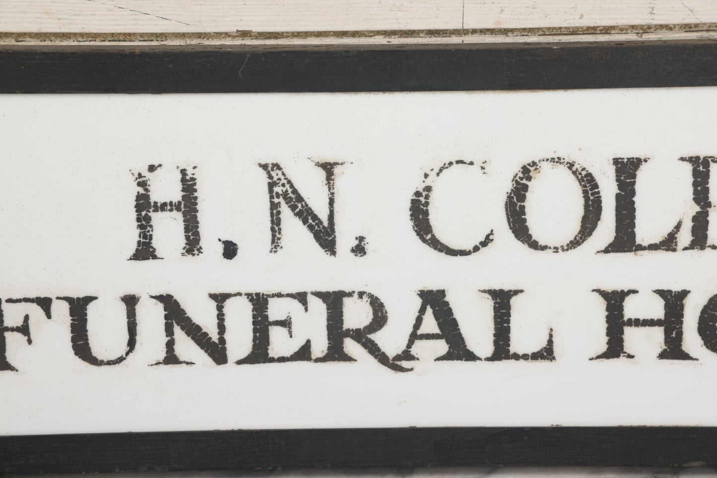 Lot 001 - Vintage Hand Painted Sign For "H.N. Colby Funeral Home" Lawrence, Massachusetts, In Metal Frame With Brackets, Painted On Vitrolite "Better Than Marble Composite Material," Circa 1940s, 25-5/8" L x 8-1/2" H