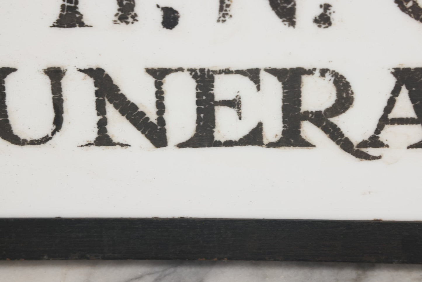 Lot 001 - Vintage Hand Painted Sign For "H.N. Colby Funeral Home" Lawrence, Massachusetts, In Metal Frame With Brackets, Painted On Vitrolite "Better Than Marble Composite Material," Circa 1940s, 25-5/8" L x 8-1/2" H