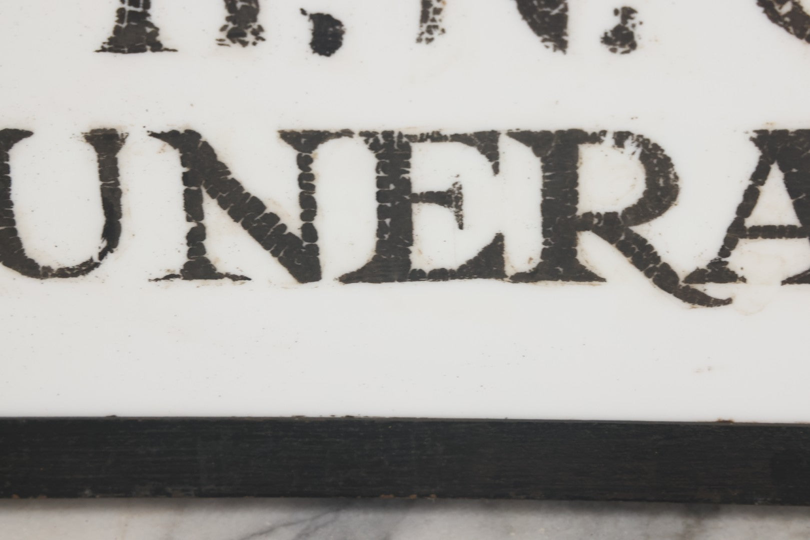 Lot 001 - Vintage Hand Painted Sign For "H.N. Colby Funeral Home" Lawrence, Massachusetts, In Metal Frame With Brackets, Painted On Vitrolite "Better Than Marble Composite Material," Circa 1940s, 25-5/8" L x 8-1/2" H