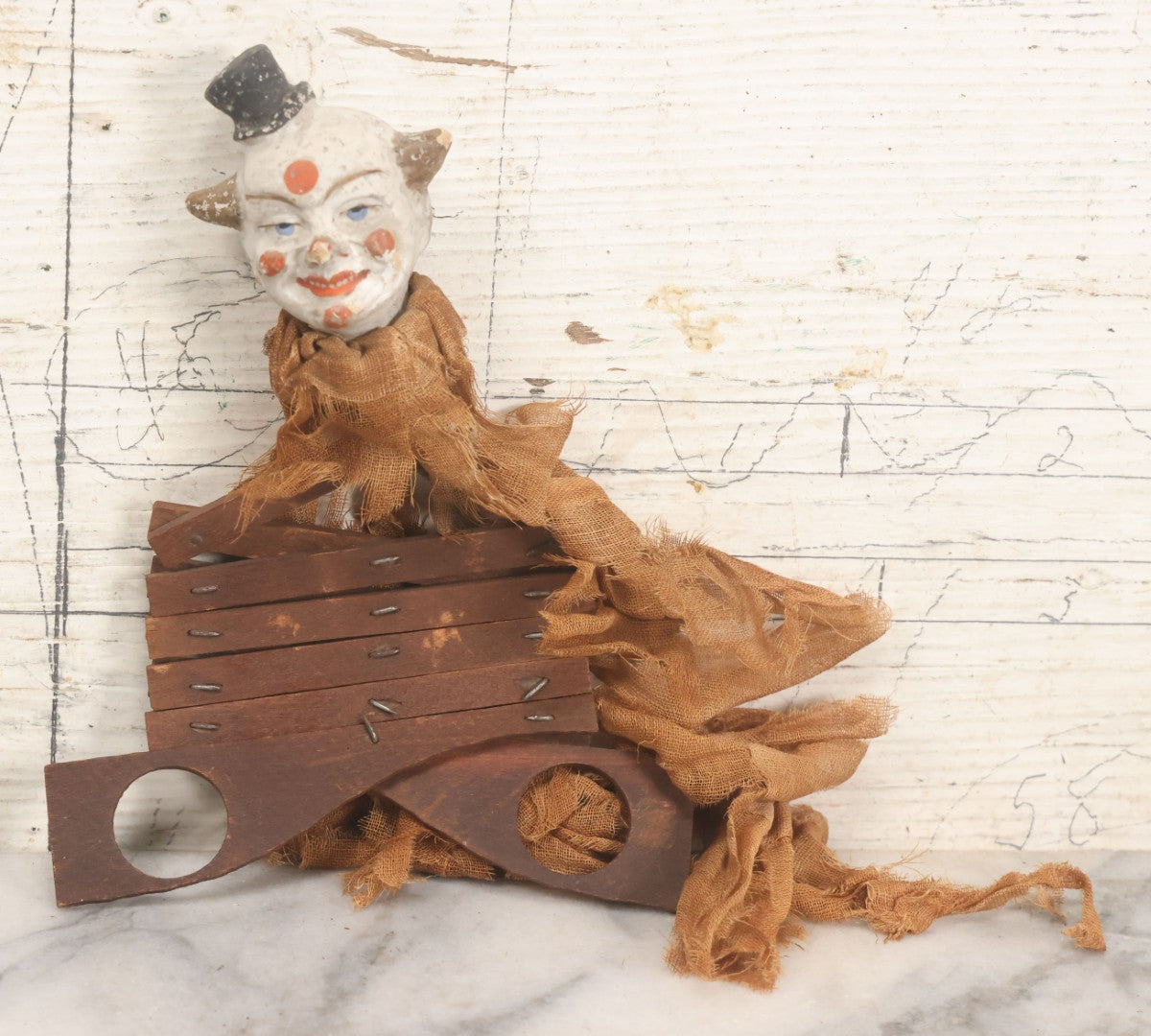 Lot 005 - Antique Animated Clown Doll With Composition Head, Remnants Of Clothes And Finger Operated Scissor Style Action