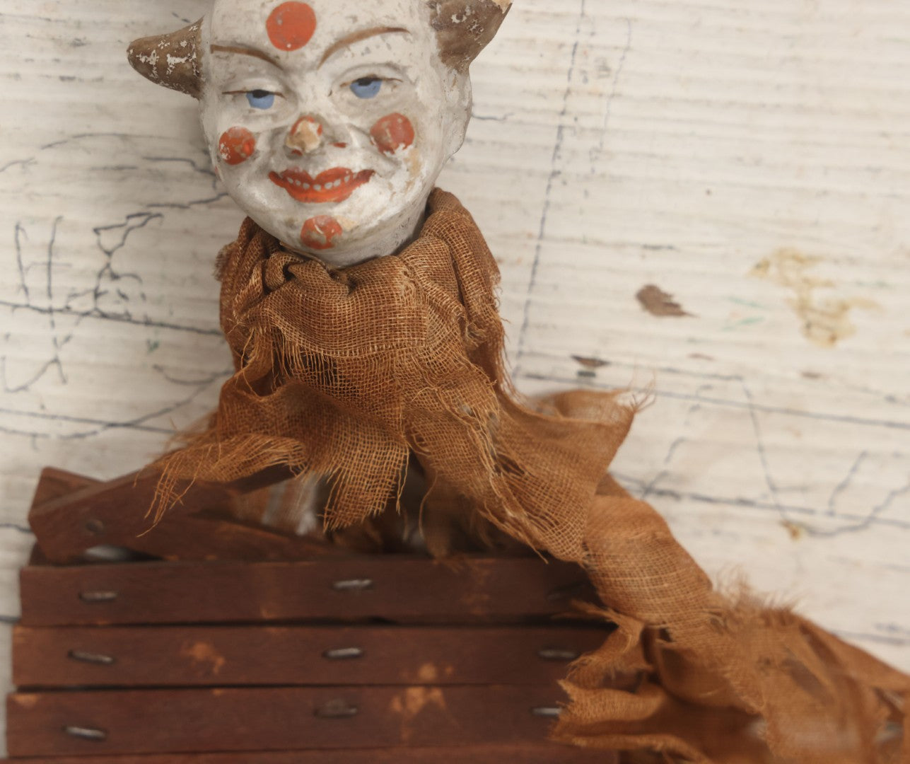 Lot 005 - Antique Animated Clown Doll With Composition Head, Remnants Of Clothes And Finger Operated Scissor Style Action