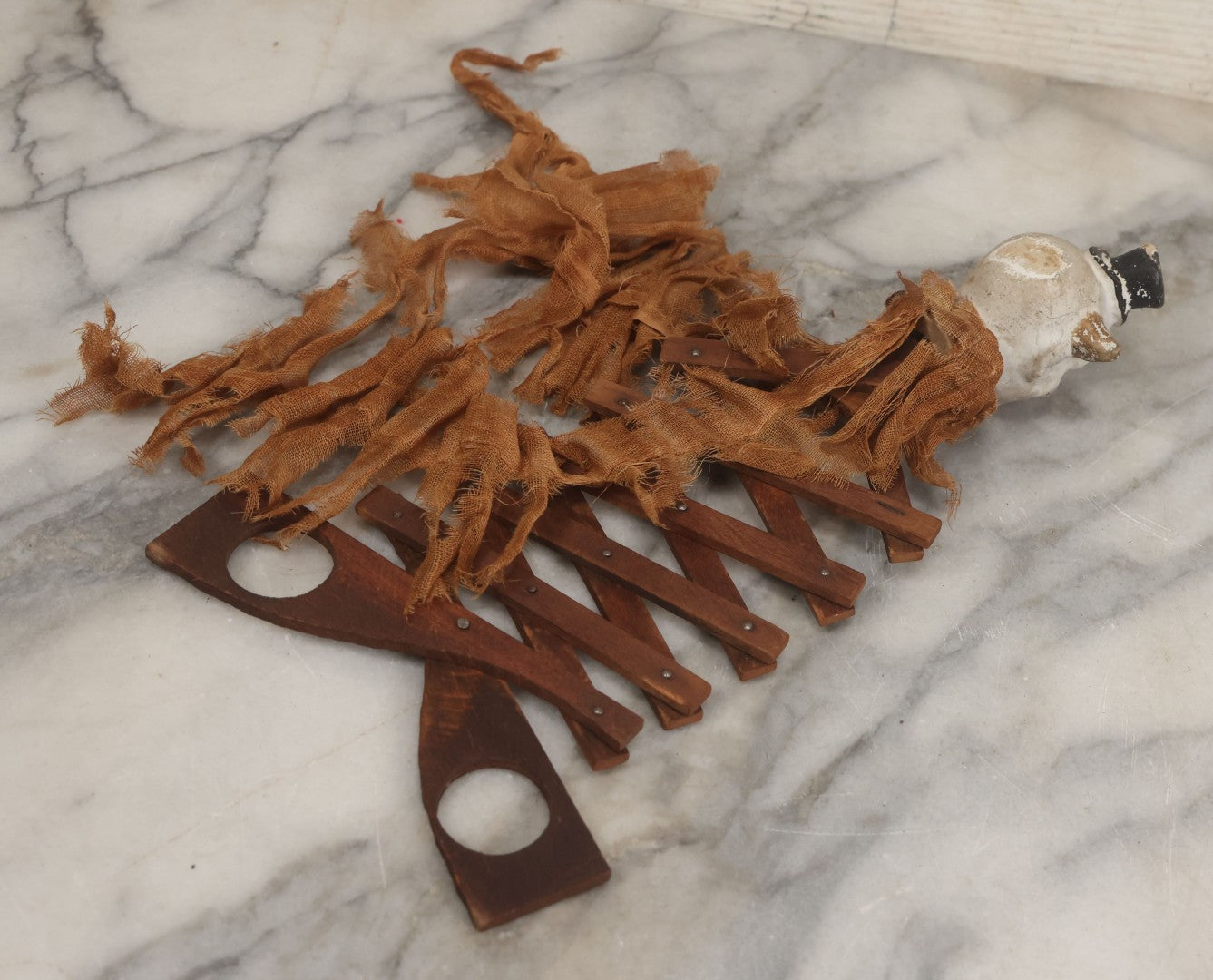 Lot 005 - Antique Animated Clown Doll With Composition Head, Remnants Of Clothes And Finger Operated Scissor Style Action