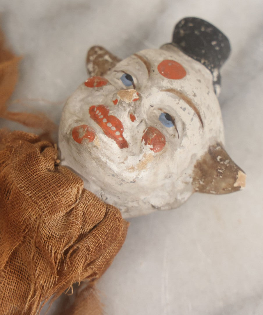 Lot 005 - Antique Animated Clown Doll With Composition Head, Remnants Of Clothes And Finger Operated Scissor Style Action