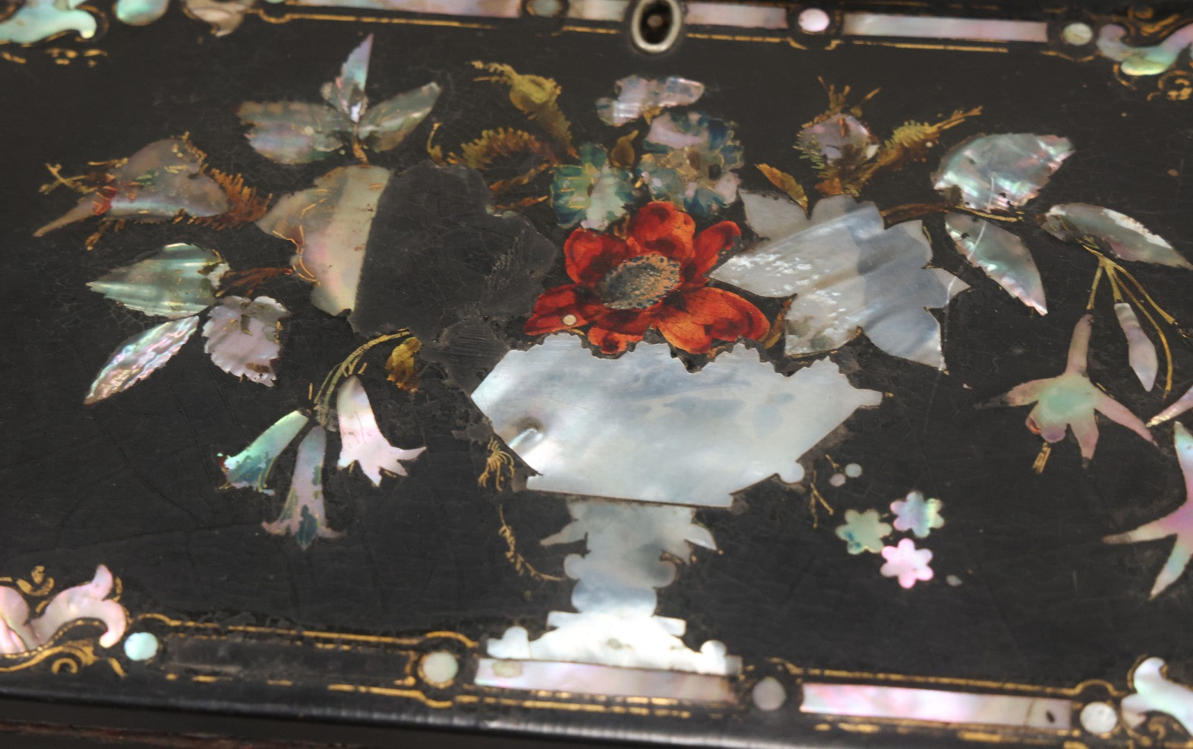 Lot 007 - Antique Black Lacquered Writing Desk Box With Mother Of Pearl Inlay And Gold Painted Decorations, Interior Velvet Lining And Pigeonhole Dividers