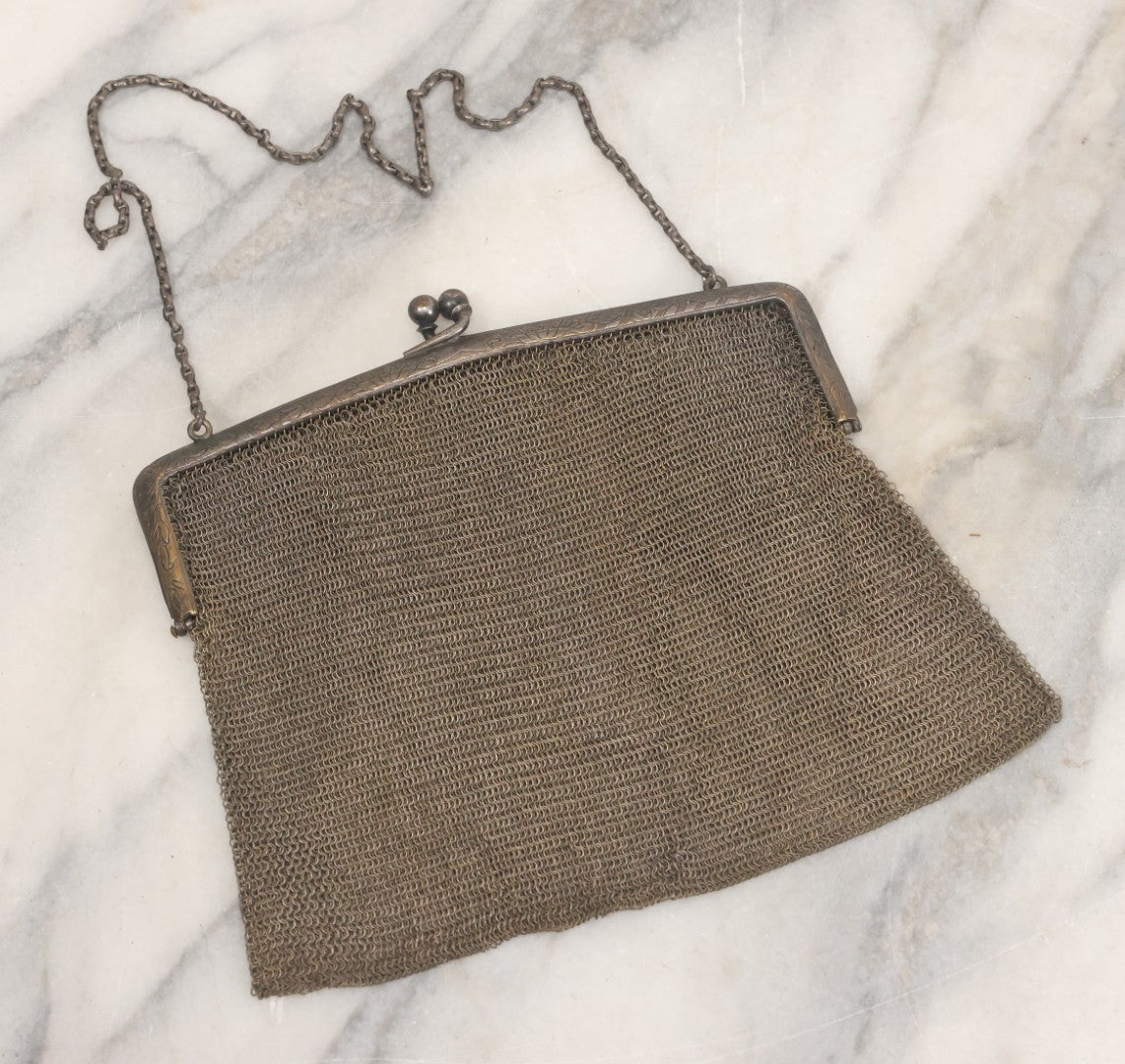 Lot 010 - Antique Whiting & Davis Co. German Silver Soldered Mesh Purse With Chain Handle And Engraved Lily Flower Decoration