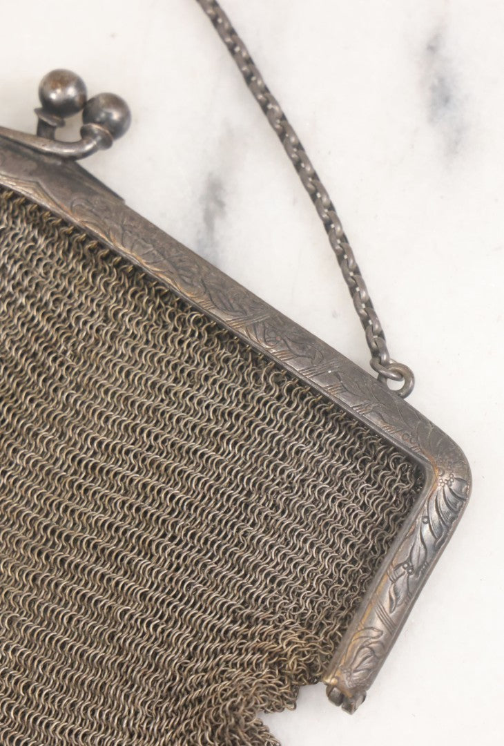 Lot 010 - Antique Whiting & Davis Co. German Silver Soldered Mesh Purse With Chain Handle And Engraved Lily Flower Decoration