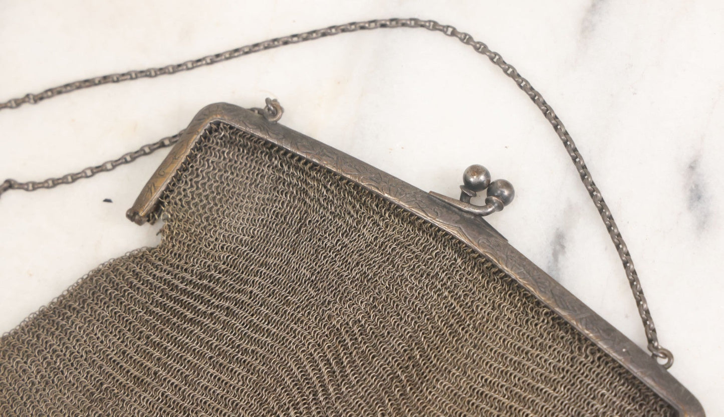Lot 010 - Antique Whiting & Davis Co. German Silver Soldered Mesh Purse With Chain Handle And Engraved Lily Flower Decoration