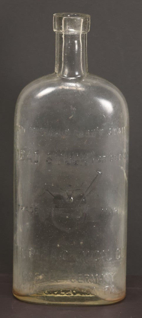 Lot 012 - Antique Bug Killer Glass Bottle, "Dead Stuck" For Bugs, With Pierced Bug Raised Graphic And Lettering, The Philadelphia Chemical Co., Castle, Germany, And Philadelphia, Pennsylvania, 8-5/8" Height