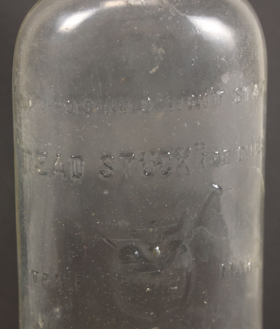 Lot 012 - Antique Bug Killer Glass Bottle, "Dead Stuck" For Bugs, With Pierced Bug Raised Graphic And Lettering, The Philadelphia Chemical Co., Castle, Germany, And Philadelphia, Pennsylvania, 8-5/8" Height