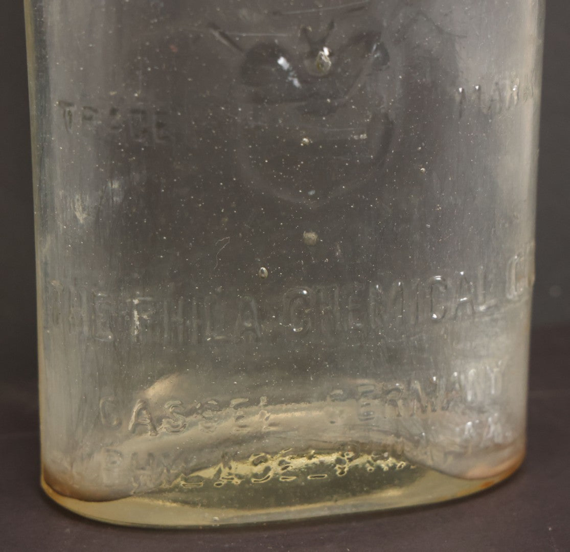 Lot 012 - Antique Bug Killer Glass Bottle, "Dead Stuck" For Bugs, With Pierced Bug Raised Graphic And Lettering, The Philadelphia Chemical Co., Castle, Germany, And Philadelphia, Pennsylvania, 8-5/8" Height