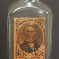 Lot 013 - Antique Bottle With Embossed Text And Original Paper Labels For Renne's Pain Killing Magic Oil Patent Medicine, "It Works Like A Charm; Clean Safe And Delicious" Manufactured By T.W. Warner & Co., New York, 6" Height