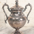 Lot 014 - Vintage Ornate Silverplate Urn With Decorative Handles, Floral Design, Lid, Manufactured By Meriden Britannia Company, No. 1835, 10" Height