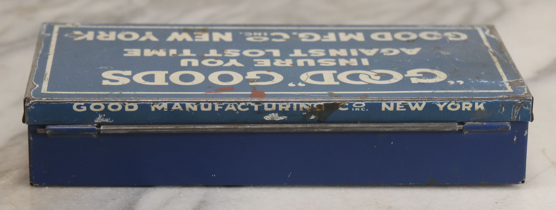 Lot 020 - Vintage "Good" Goods Divided Advertising Tin, "Insure You Against Lost Time," Good Manufacturing Co. Inc., New York