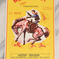 Lot 026 - Vintage Western Boy Firecrackers Lithographed Fireworks Label With Cowboy Graphics, Copyrighted And Distributed By Rich Brothers, Sioux Falls, South Dakota, Made In Macao