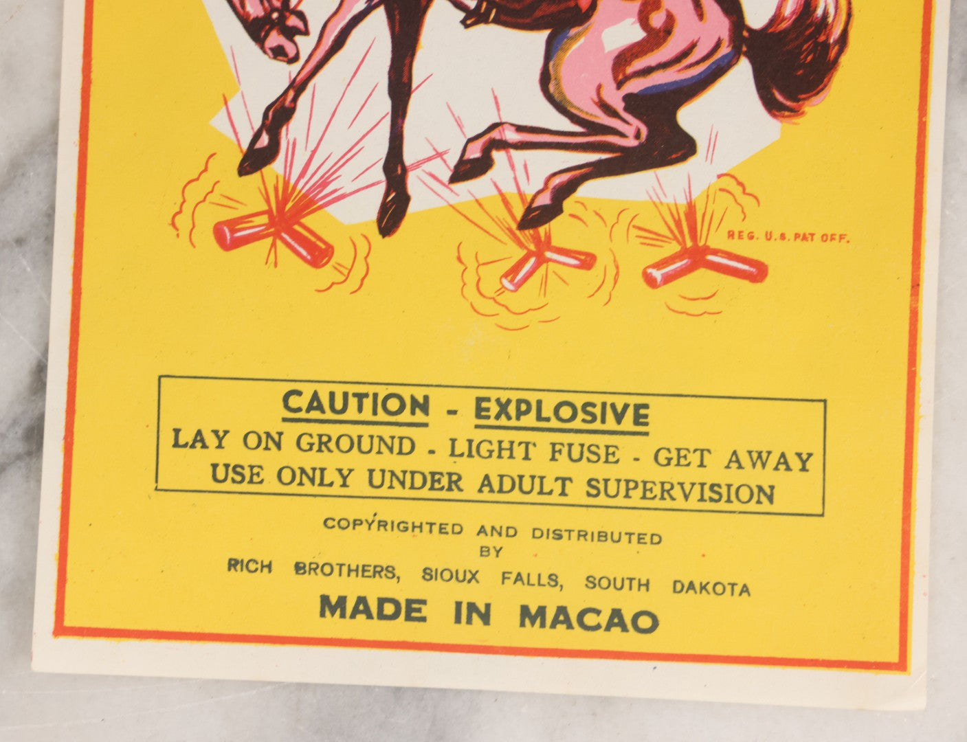 Lot 026 - Vintage Western Boy Firecrackers Lithographed Fireworks Label With Cowboy Graphics, Copyrighted And Distributed By Rich Brothers, Sioux Falls, South Dakota, Made In Macao