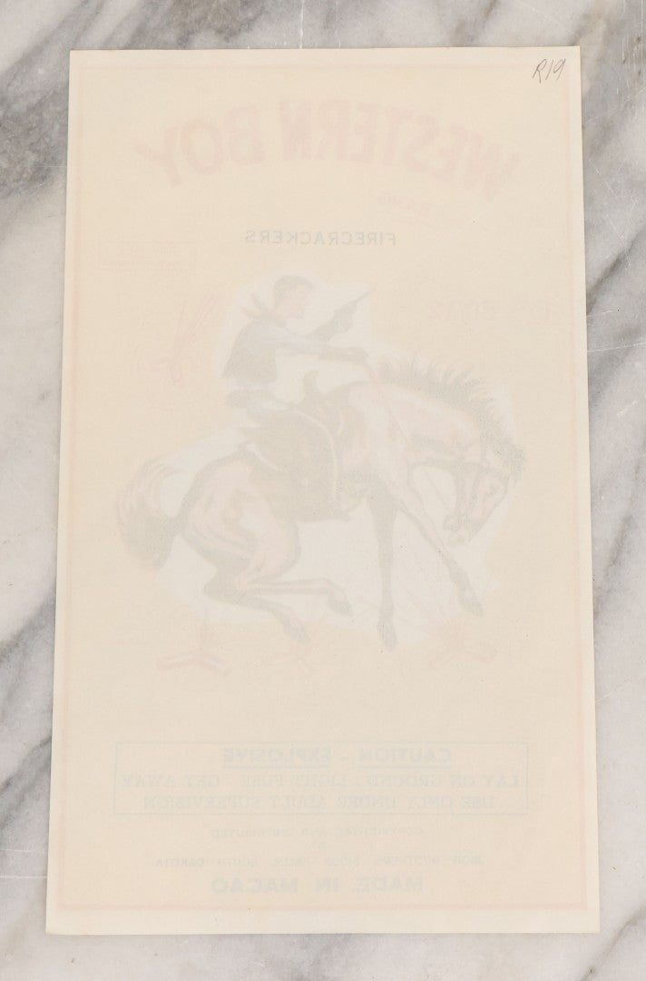 Lot 026 - Vintage Western Boy Firecrackers Lithographed Fireworks Label With Cowboy Graphics, Copyrighted And Distributed By Rich Brothers, Sioux Falls, South Dakota, Made In Macao