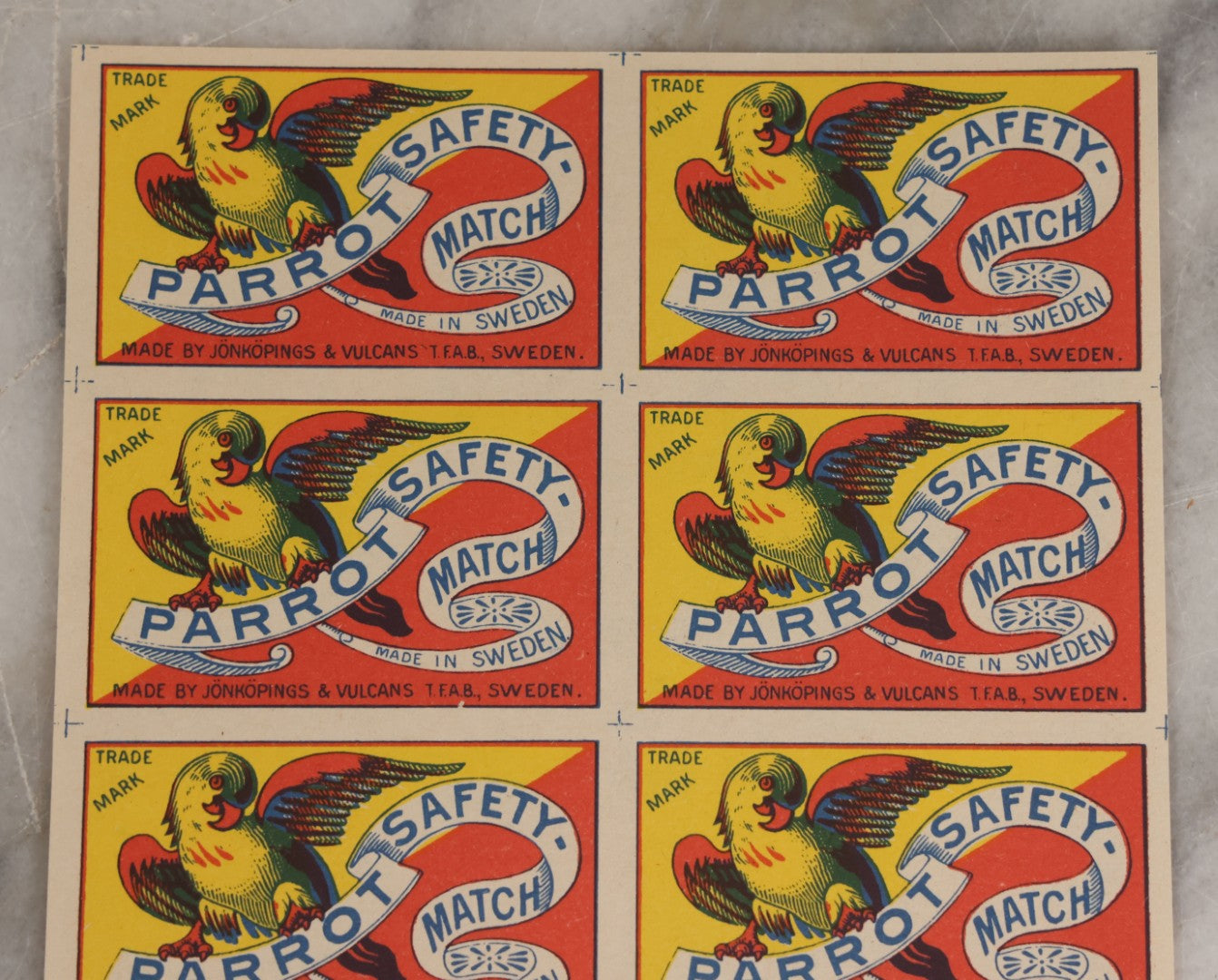Lot 027 - Vintage Uncut Sheet Of Ten Lithographed Parrott Safety-Match Matchbox Labels, Made In Sweden, By Jönköpings & Vulcans