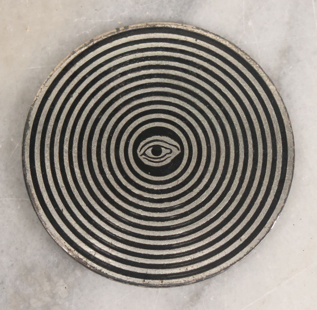 Lot 035 - Vintage Magician's Hypnotist Medallion With Eye At Center, Manufactured By Bastian Bros., Rochester, New York, 2-1/4" Diameter