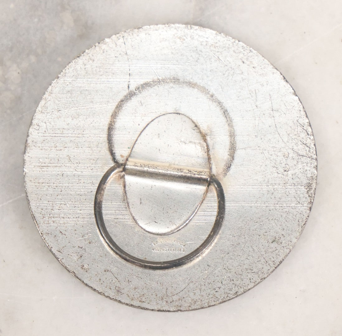 Lot 035 - Vintage Magician's Hypnotist Medallion With Eye At Center, Manufactured By Bastian Bros., Rochester, New York, 2-1/4" Diameter