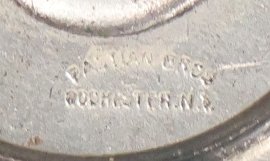 Lot 035 - Vintage Magician's Hypnotist Medallion With Eye At Center, Manufactured By Bastian Bros., Rochester, New York, 2-1/4" Diameter