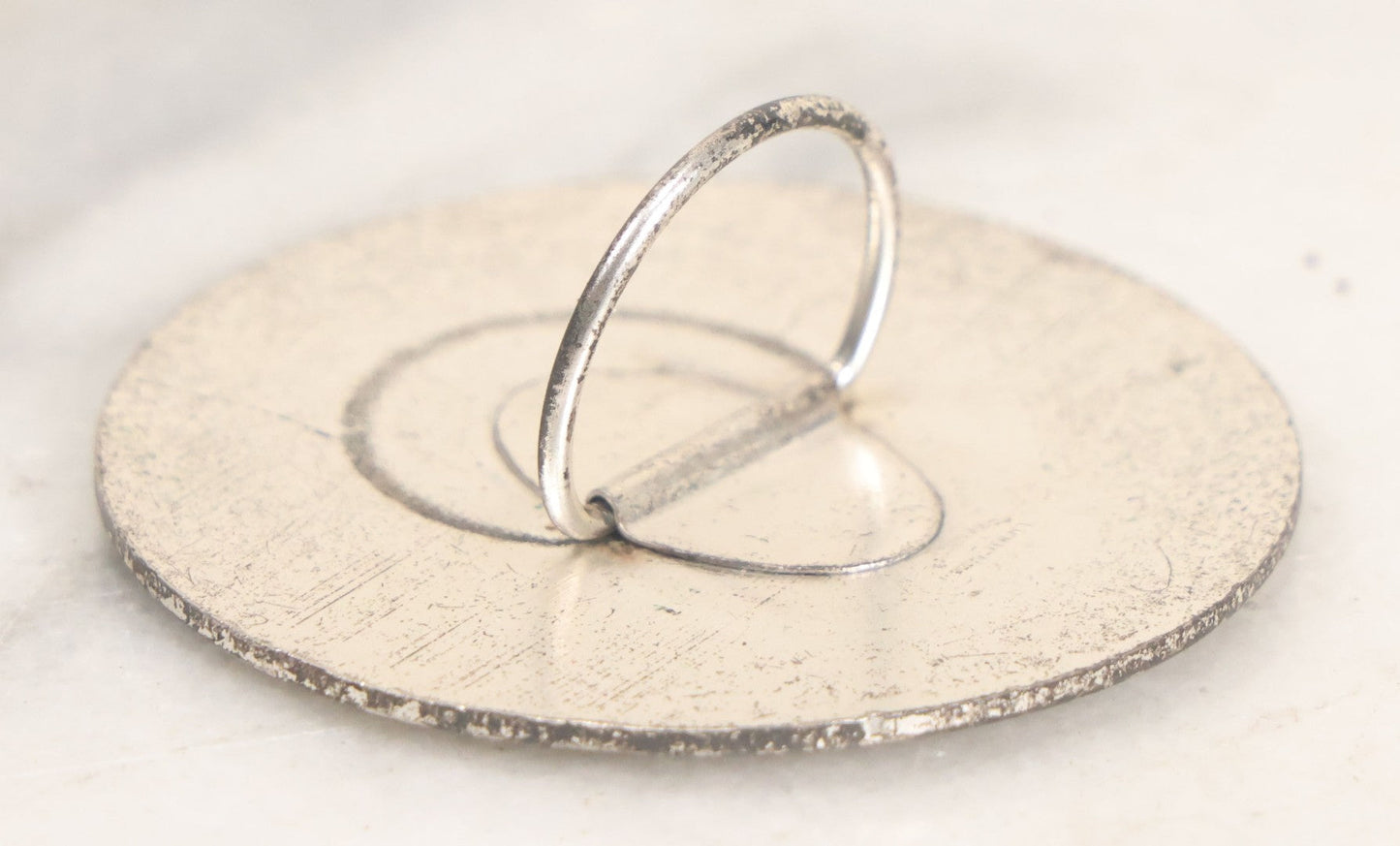 Lot 035 - Vintage Magician's Hypnotist Medallion With Eye At Center, Manufactured By Bastian Bros., Rochester, New York, 2-1/4" Diameter