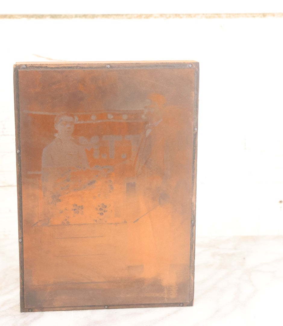 Lot 036 - Grouping Of Ten Vintage Photo Printing Blocks Showing A Magician Engaged In Various Magic Tricks, Magician's Banner Visible, "M.T.T.," Various Tricks Incl. Ring Trick, Flag Trick, And More