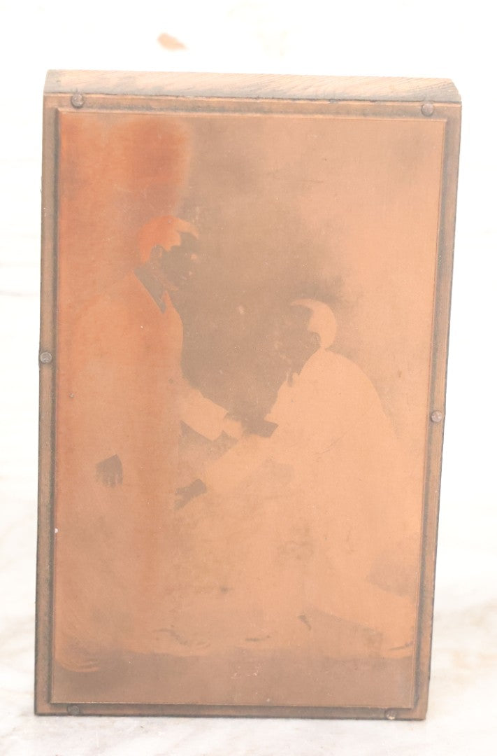 Lot 036 - Grouping Of Ten Vintage Photo Printing Blocks Showing A Magician Engaged In Various Magic Tricks, Magician's Banner Visible, "M.T.T.," Various Tricks Incl. Ring Trick, Flag Trick, And More