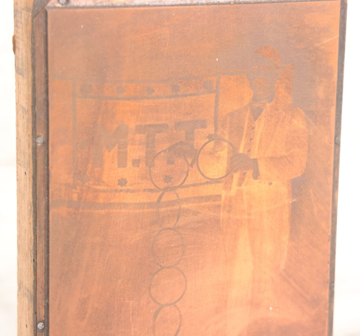 Lot 036 - Grouping Of Ten Vintage Photo Printing Blocks Showing A Magician Engaged In Various Magic Tricks, Magician's Banner Visible, "M.T.T.," Various Tricks Incl. Ring Trick, Flag Trick, And More