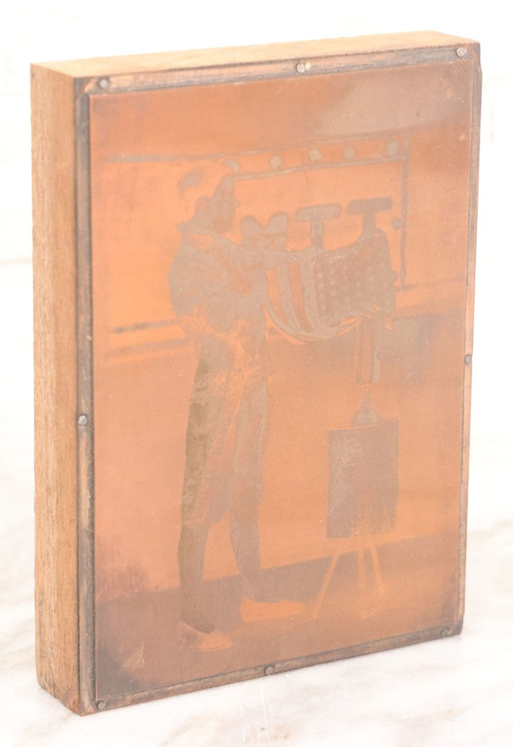 Lot 036 - Grouping Of Ten Vintage Photo Printing Blocks Showing A Magician Engaged In Various Magic Tricks, Magician's Banner Visible, "M.T.T.," Various Tricks Incl. Ring Trick, Flag Trick, And More