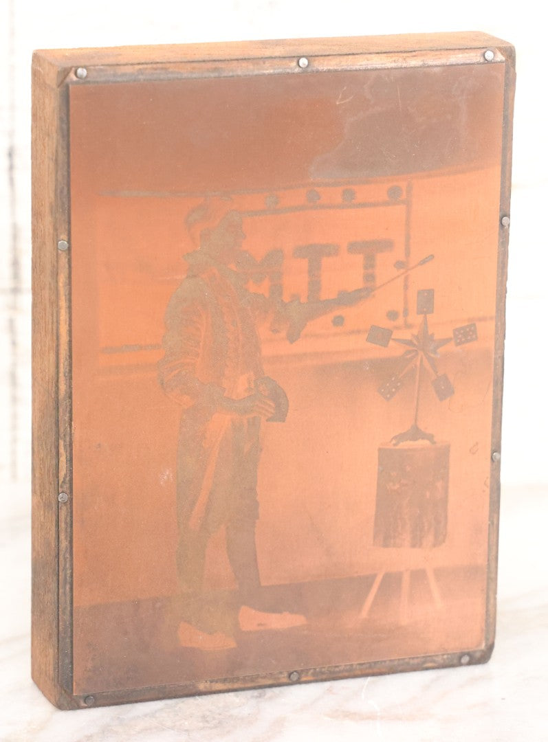 Lot 036 - Grouping Of Ten Vintage Photo Printing Blocks Showing A Magician Engaged In Various Magic Tricks, Magician's Banner Visible, "M.T.T.," Various Tricks Incl. Ring Trick, Flag Trick, And More