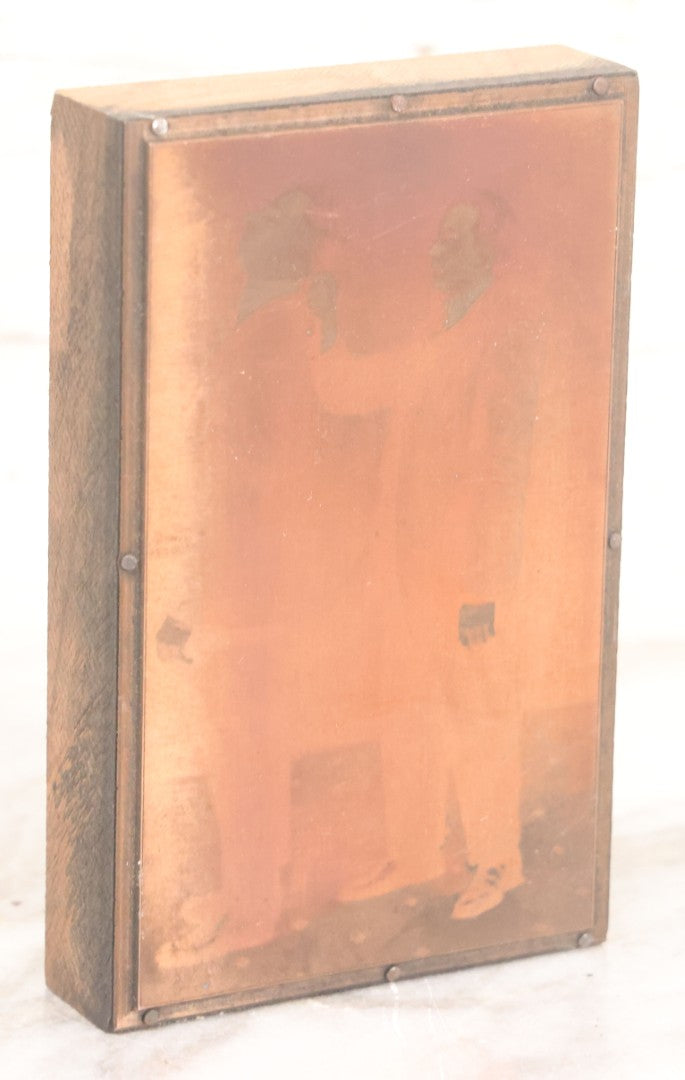 Lot 036 - Grouping Of Ten Vintage Photo Printing Blocks Showing A Magician Engaged In Various Magic Tricks, Magician's Banner Visible, "M.T.T.," Various Tricks Incl. Ring Trick, Flag Trick, And More