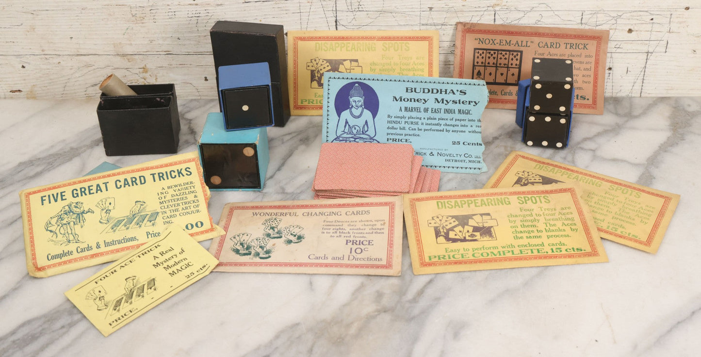 Lot 037 - Vintage Magician's Grouping With Several Foldered Card Tricks, Nesting Dice Tricks, String Of Cards Trick, Dummy Card Deck, And Other Misc. Pieces