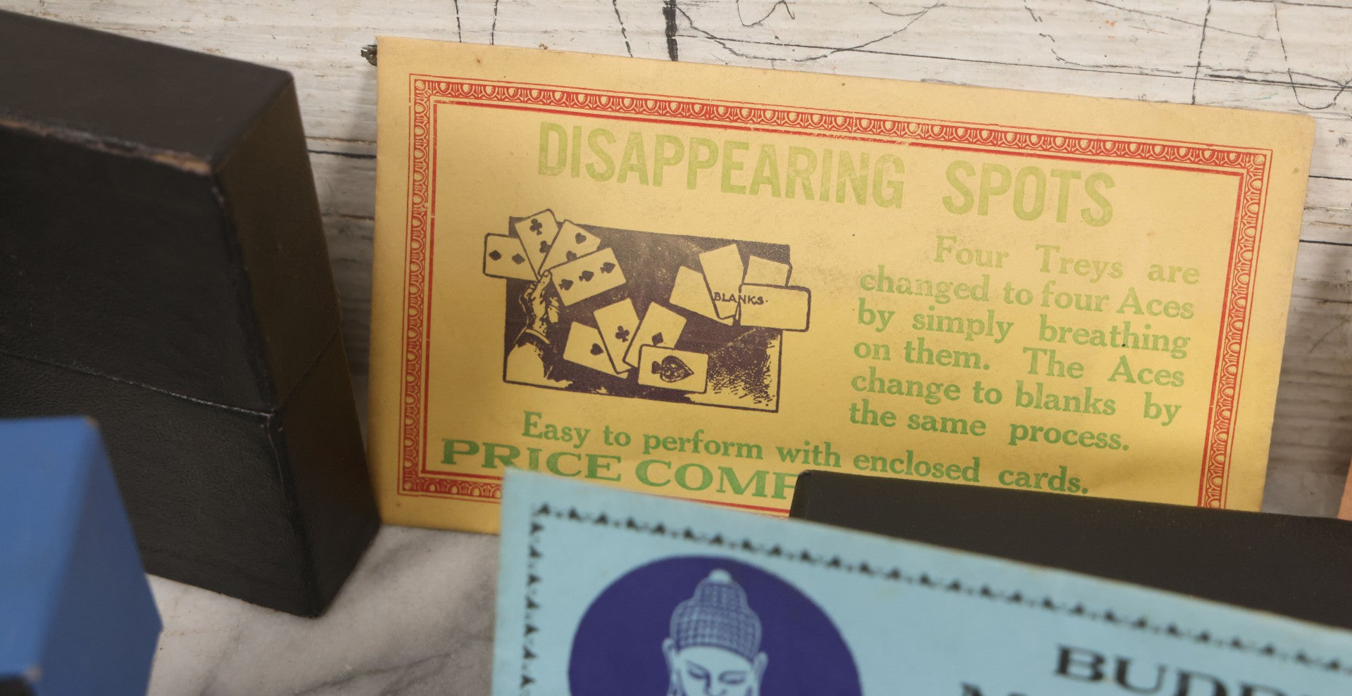 Lot 037 - Vintage Magician's Grouping With Several Foldered Card Tricks, Nesting Dice Tricks, String Of Cards Trick, Dummy Card Deck, And Other Misc. Pieces