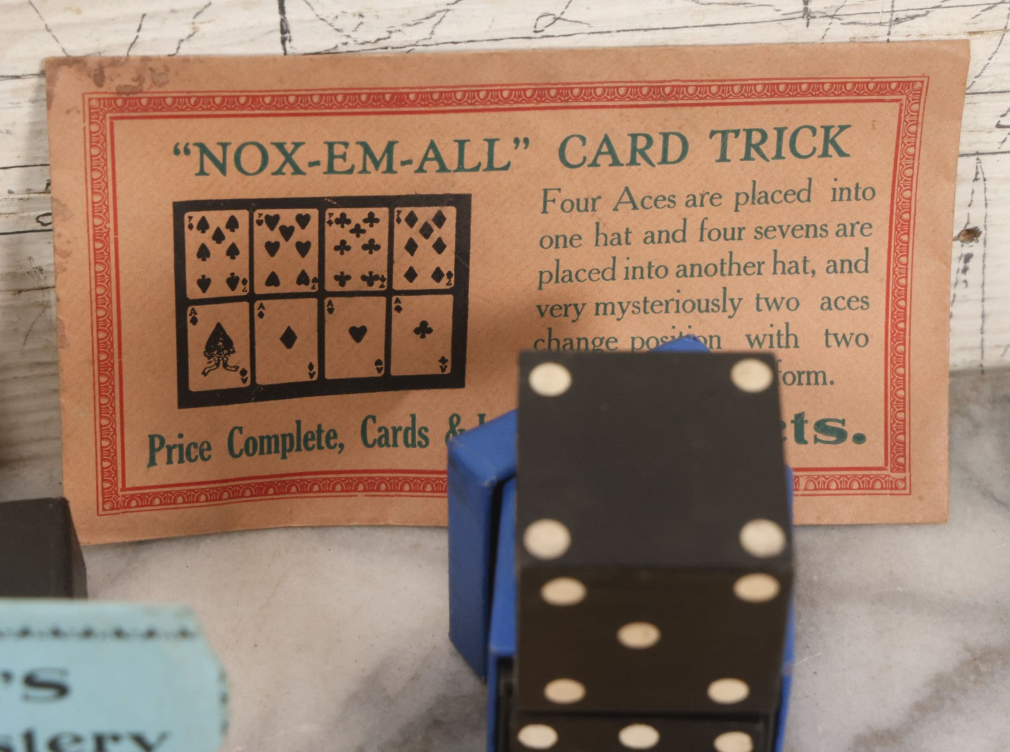 Lot 037 - Vintage Magician's Grouping With Several Foldered Card Tricks, Nesting Dice Tricks, String Of Cards Trick, Dummy Card Deck, And Other Misc. Pieces