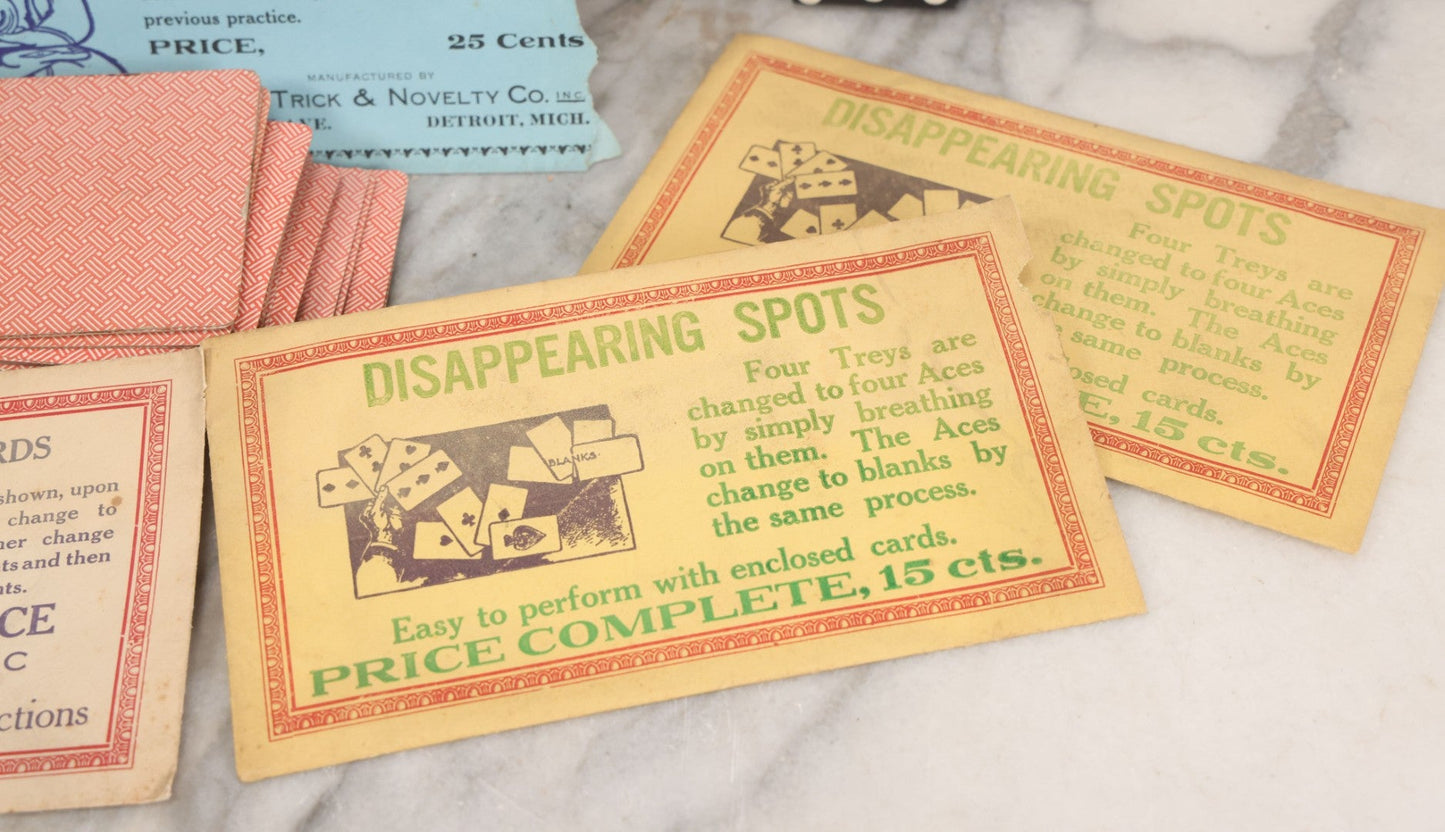Lot 037 - Vintage Magician's Grouping With Several Foldered Card Tricks, Nesting Dice Tricks, String Of Cards Trick, Dummy Card Deck, And Other Misc. Pieces
