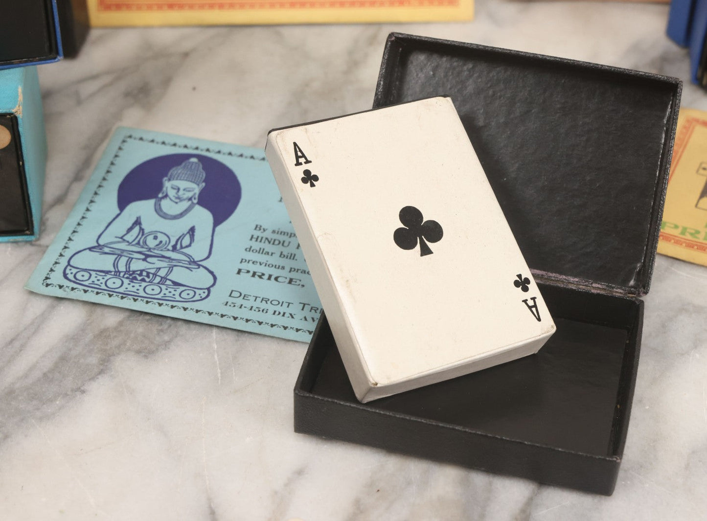 Lot 037 - Vintage Magician's Grouping With Several Foldered Card Tricks, Nesting Dice Tricks, String Of Cards Trick, Dummy Card Deck, And Other Misc. Pieces