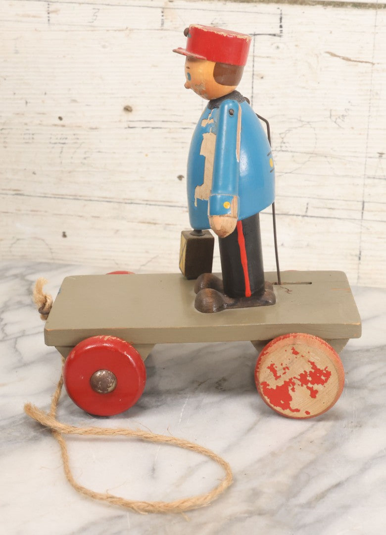 Lot 044 - Vintage Handmade Wooden Wheeled Cart With Train Conductor Holding Lantern Animated Pull Toy, Lantern Arm Moves Up And Down, Made In Czechoslovakia, Note Paint Losses