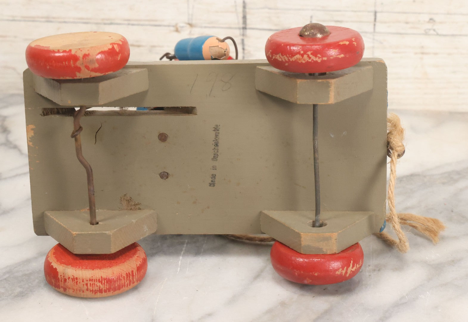 Lot 044 - Vintage Handmade Wooden Wheeled Cart With Train Conductor Holding Lantern Animated Pull Toy, Lantern Arm Moves Up And Down, Made In Czechoslovakia, Note Paint Losses