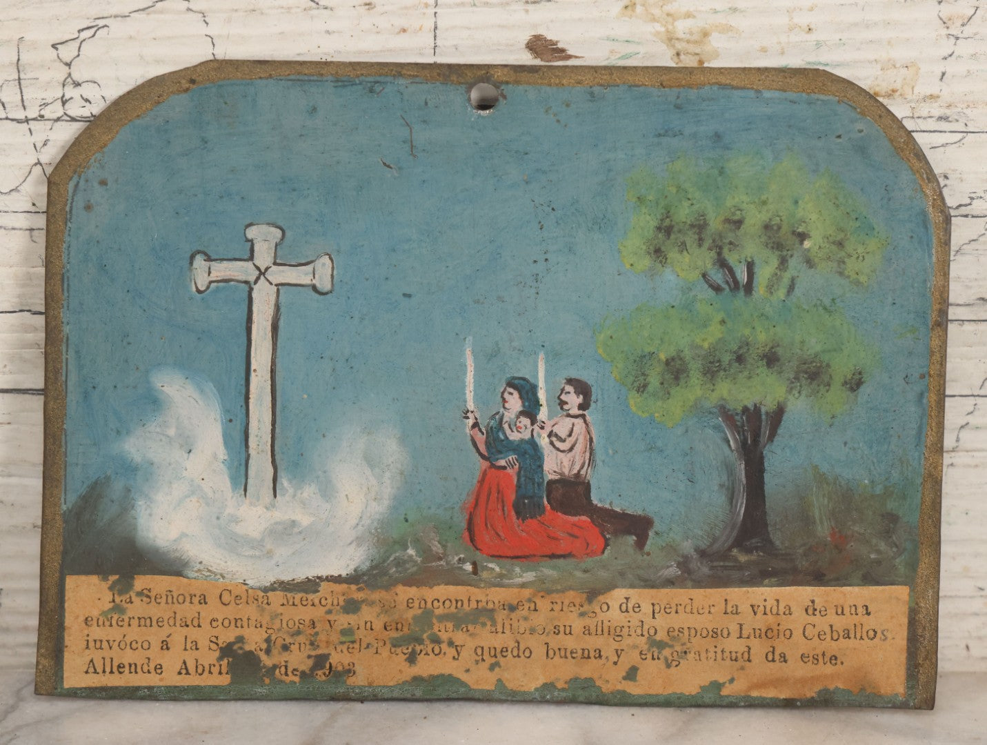 Lot 052 - Vintage Mexican Ex-Voto Retablo Devotional Folk Art Painting On Tin Commemorating The Intercession Of The Holy Spirit In Curing A Sick Woman After Calling Upon The Holy Cross, Allende, Mexico, April 1903, 6-1/2" W x 4-5/8" H