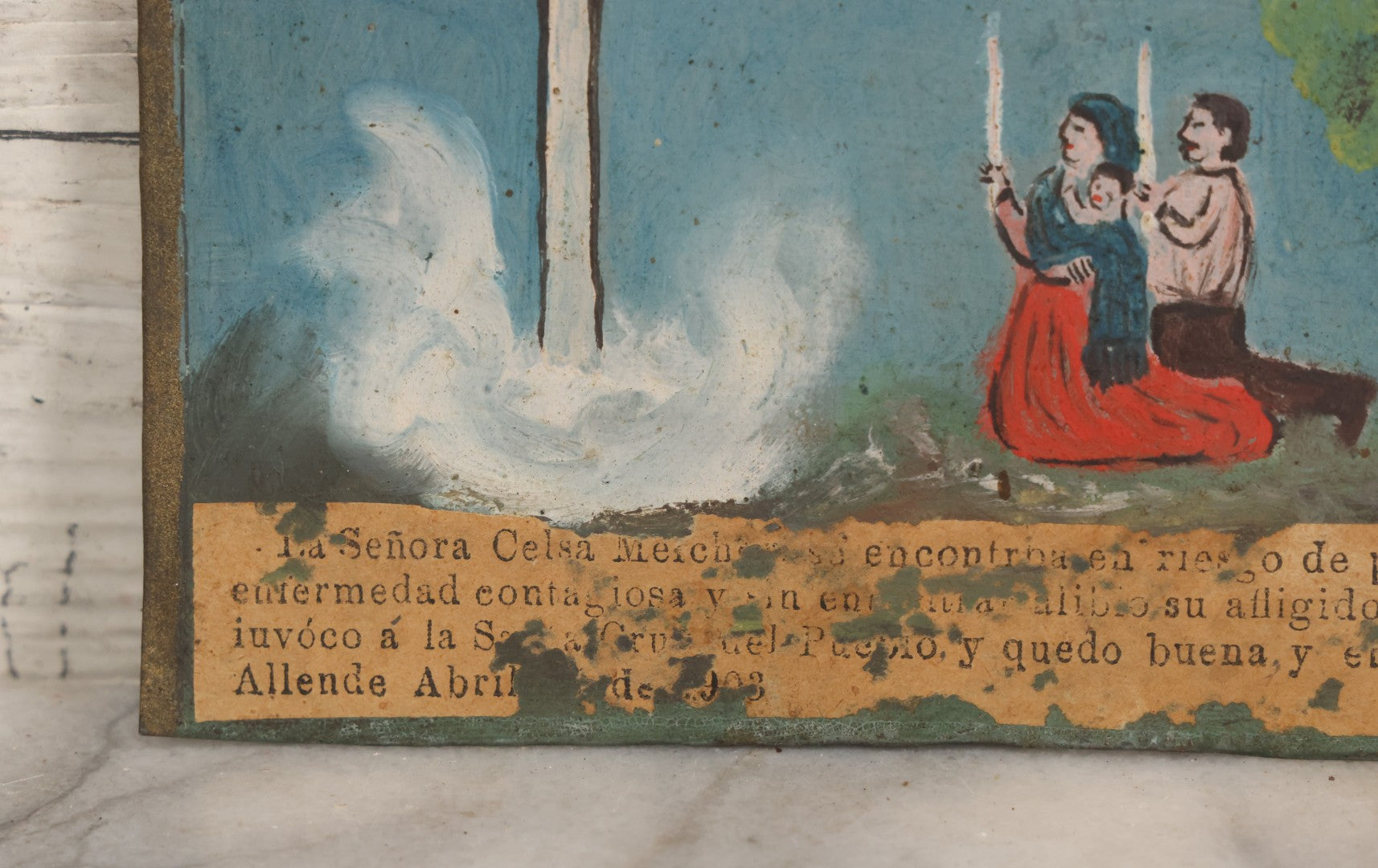 Lot 052 - Vintage Mexican Ex-Voto Retablo Devotional Folk Art Painting On Tin Commemorating The Intercession Of The Holy Spirit In Curing A Sick Woman After Calling Upon The Holy Cross, Allende, Mexico, April 1903, 6-1/2" W x 4-5/8" H