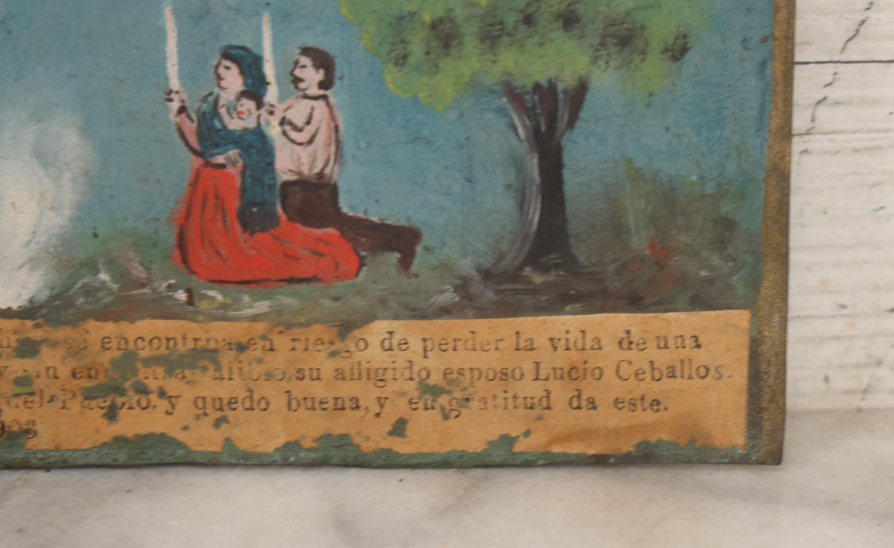 Lot 052 - Vintage Mexican Ex-Voto Retablo Devotional Folk Art Painting On Tin Commemorating The Intercession Of The Holy Spirit In Curing A Sick Woman After Calling Upon The Holy Cross, Allende, Mexico, April 1903, 6-1/2" W x 4-5/8" H